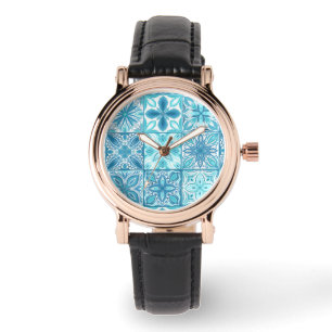 Ornate tiles in blue and white watch