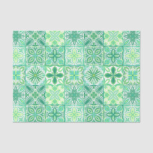 Ornate tiles in green and white tissue paper