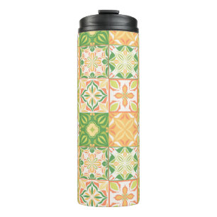 Ornate tiles in green and yellow thermal tumbler