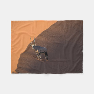 Oryx on the edge, Namibia Fleece Blanket