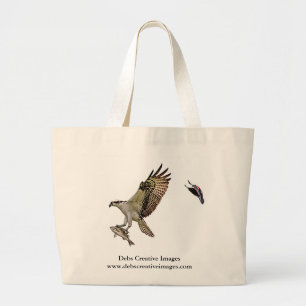 Osprey being chased by a red winged blackbird large tote bag