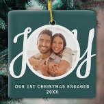 Our 1st Christmas Engaged Photo Green Keepsake Ceramic Ornament<br><div class="desc">This keepsake First Christmas Engaged photo ornament is decorated with the word JOY in stylish script typography on a green background. Easily customisable.</div>