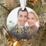 Our First Christmas 2 Photo Wedding Ornament<br><div class="desc">A true keepsake for the newlyweds features a modern script and modern typography in gold. Add your favourite photo. Makes a great gift for yourself or someone special.</div>