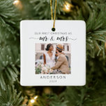 Our First Christmas As Mr & Mrs Photo Minimalist Ceramic Ornament<br><div class="desc">Celebrate your first Christmas as Mr. and Mrs. with our exquisite "Our First Christmas Mr. and Mrs." Minimalist Photo Ceramic Ornament. This ornament beautifully blends simplicity with sentimentality, featuring a pristine white ceramic background adorned with charming hand-drawn Christmas tree illustrations. It adds a touch of elegance and nostalgia to your...</div>