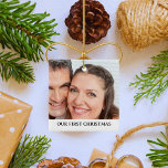 Our First Christmas Couple's Photo Ceramic Ornament<br><div class="desc">Celebrate the joy of your first Christmas together with our beautiful "Our First Christmas" Couple's Photo Ceramic Ornament. Crafted with elegance, this timeless keepsake captures the essence of your love and provides a cherished space to showcase a special photograph, creating a lasting memory that will adorn your holiday season for...</div>