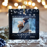 Our First Christmas Engaged Blue Wood Lights Photo Ceramic Ornament<br><div class="desc">Our First Christmas Engaged Double Sided Photo Ornament - Front & Back Photos,  Names on Back - Rustic Country Blue Wood and String Lights</div>
