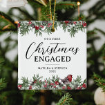 Our First Christmas Engaged Keepsake Ceramic Ornament<br><div class="desc">Engagement keepsake christmas ornament featuring elegant watercolor botancial christmas foliage,  a robin,  snowdrops,  the saying "our first christmas engaged",  your names,  and the year.</div>