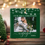 Our First Christmas Engaged Lights Photo Green Ceramic Ornament<br><div class="desc">Snow Topped Our First Christmas Engaged Double Sided Photo Green Ornament - Front & Back Photos,  Names on Back - String Lights</div>