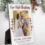 Our first Christmas married photo Plaque<br><div class="desc">Married couple's first Christmas as Mr. and Mrs. unique keepsake plaque with red berries branches,  your custom photo and red modern typography script text.           Can be a beautiful gift for newlyweds.</div>