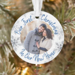 Our First Christmas New Home Blue and Silver Photo Ornament<br><div class="desc">Our First Christmas in our new Home custom photo ornament,  with blue typography and silver snowflakes. The photo template is set up for you to add one of your favorite pictures and you can also add your names and the year on the back.</div>