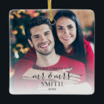 Our First Christmas Newlywed Mr and Mrs Wedding Ceramic Ornament<br><div class="desc">Our First Christmas Newlywed Mr Mrs Wedding Christmas Ornament. Features simple modern elegant calligraphy script typography design. Personalise with your photos,  family name and adjust all text and colours. Christmas gift for newlyweds.</div>