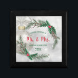 Our First Christmas | Pretty Wreath Mr. & Mrs Gift Box<br><div class="desc">Celebrate your first year of life together with this precious "Our First Christmas" gift box. This design features a pretty silver background with a white Christmas ornament and a white ribbon. Above it, there is a elegant wreath with pine branches and mistletoe berries. The customisable text reads "Our first Christmas...</div>