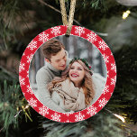 Our First Christmas Red Snowflake Photo Ornament<br><div class="desc">This modern holiday keepsake ornament features a photo of the newlywed couple on the front framed by a red colour with contrasting pattern of white winter snowflakes. The back of the design includes the same colour scheme with "Our First Christmas" wording and a custom monogram of their names and the...</div>