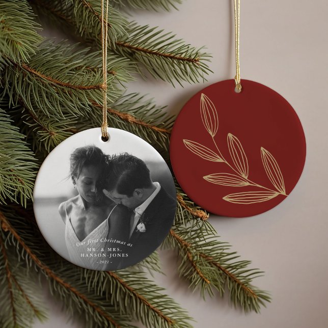 Our First Christmas Ruby Sprout Ceramic Ornament (Our first Christmas couples photo ornament featuring a hand-drawn botanical sprout on ruby red.)