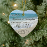 Our First Christmas Together Mr Mrs Beach Wedding Ceramic Tree Decoration<br><div class="desc">Custom personalised names and year. Our Firt Christmas as Mr. and Mrs. Beach wedding ornament. Remember a beach wedding or honeymoon with this keepsake wedding ornament. First Christmas together with two interlocking beach wedding hearts drawn in the sand makes an elegant tropical ocean coastal nautical theme wedding, matching set of...</div>