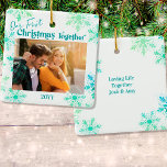 Our First Christmas Together Photo Green Snowflake Ceramic Ornament<br><div class="desc">"Our first Christmas together" - personalised Christmas ornaments are a lovely keepsake to have as part of your Christmas decor. The template is set up ready for you to personalise the ornament with your photo, your names and the year. The design includes hand lettered style script typography and a light...</div>