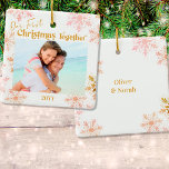 Our First Christmas Together Photo Pink Gold Ceramic Ornament<br><div class="desc">"Our first Christmas together" - personalized Christmas ornaments are a lovely keepsake to have as part of your Christmas decor. The template is set up ready for you to personalize the ornament with your photo, your names and the year. The design includes hand lettered style script typography and a light...</div>