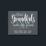 "Our Grandkids Make Life Grand" Personalised Canvas Print<br><div class="desc">Background in dark blue-grey. Text in white and seafoam green. Decorative handwritten text saved on a separate layer, so you can re-position or re-size, if needed. Personalise with your grandchildren's names. (To keep the dots in between names, simply highlight and replace one name at a time. Delete any excess names....</div>