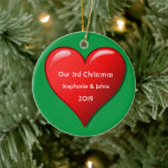 Our Third Christmas Together Cute Red Heart 2019 Ceramic Tree Decoration<br><div class="desc">Personalised names and printed with cute red heart design in solid green background. Feel free to customise by adding your own texts,  names or photos. You can add your photo on the back side of the ornament easily!
The colour of the background can also be changed as you want.</div>