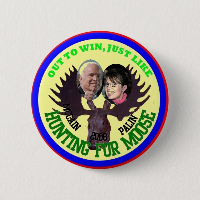 OUT TO WIN 6 CM ROUND BADGE (Front)