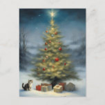 Outdoor Christmas Tree with Kitten and Presents Postcard<br><div class="desc">The image depicts a serene winter scene centred around a decorated Christmas tree. The tree is adorned with ornaments, which stand out against the tree's green needles. At the top of the tree, a bright star shines, casting a warm light over the scene. In the foreground, a small, fluffy kitten...</div>