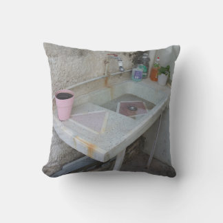 Outdoor pillow with photo of an old house 