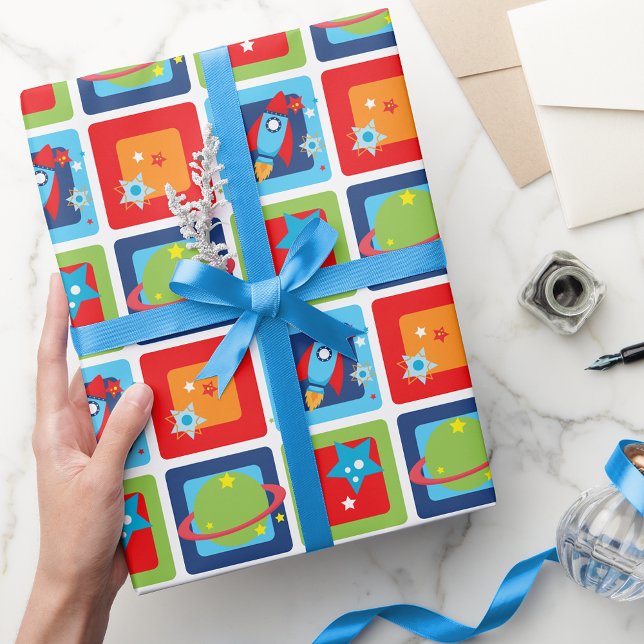 Outer Space Rocket & Planet Wrapping Paper (Outer Space Rocket & Planet Wrapping Paper in Orange, Green, Red and Blue)
