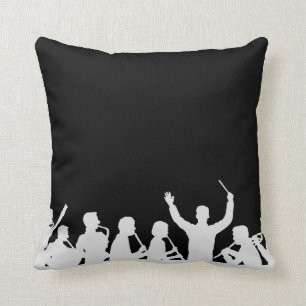 Outline of conductor and band white on black cushion