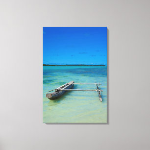 Outrigger Canoe In Shallow Ocean Canvas Print