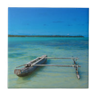 Outrigger Canoe In Shallow Ocean