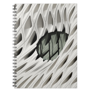 Oval black tint glass panel on white surface notebook