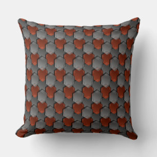 Overlapping grey and red hexagons cushion