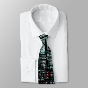 Overlapping narrow, linear cutouts intersecting on tie
