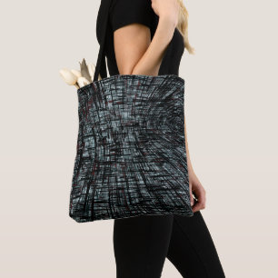 Overlapping narrow, linear cutouts intersecting on tote bag
