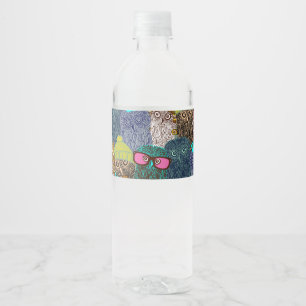 Owl in crown water bottle label