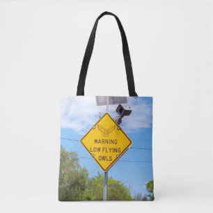 Owls warning sign on an all over printed tote bag