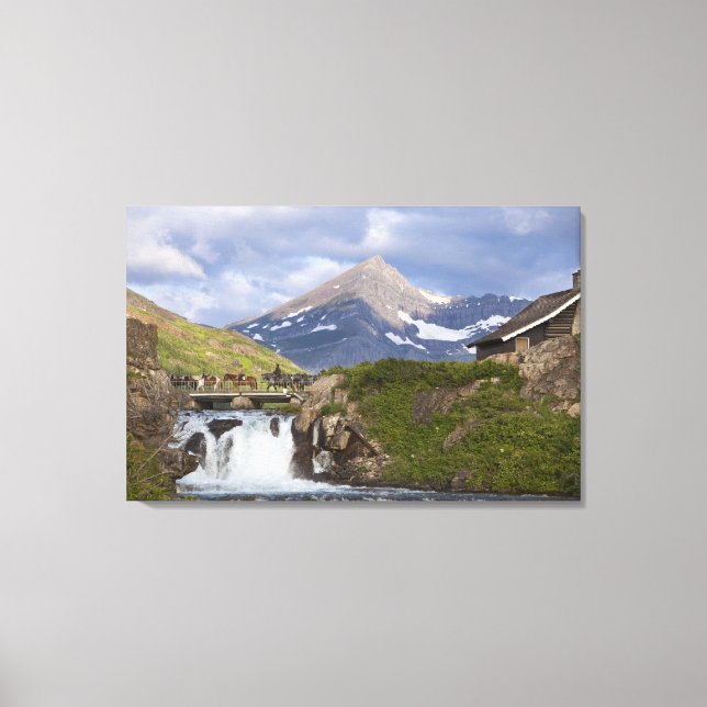 Packers lead string of horses over bridge above canvas print (Front)