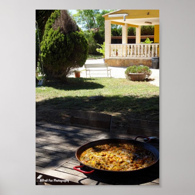 Paella Dish Resting in Garden Poster (Front)