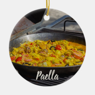 Paella is cooked on a grill gift for chef ceramic tree decoration