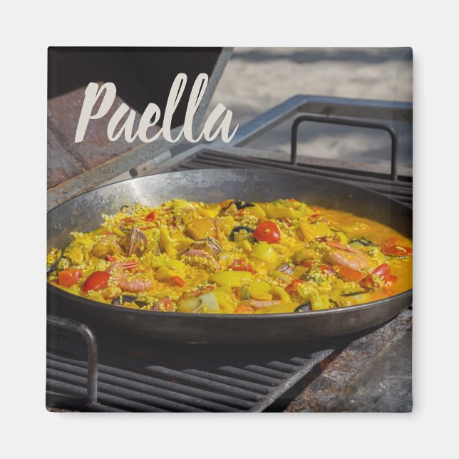 Paella is cooked on a grill gift for chef magnet (Front)