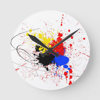 Paint Splatter Art Black Blue Red Yellow Round Clock