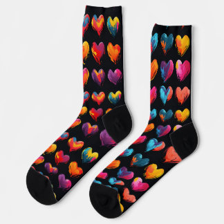 Painted hearts on a black background socks