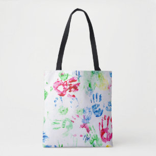 painted kid hand prints on white tote bag