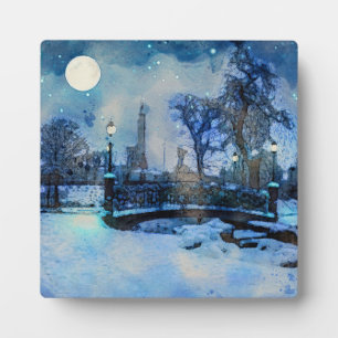 Painting of winter night in city park plaque