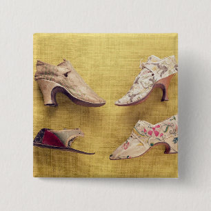 Pair of embroidered shoes, c.1714 15 cm square badge