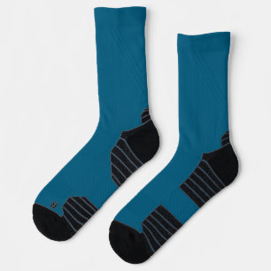 pair of teal-blue socks with black heel