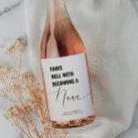 Pairs Well With Baby Announcement Nana Wine Label<br><div class="desc">Give your Mum or Mother in-law the ultimate surprise with this "Pairs Well with Becoming A Nana" wine label! This trendy, minimalistic design is the perfect way to share the exciting news of your pregnancy in a fun and memorable way. Simply attach the label to a bottle of wine (or...</div>