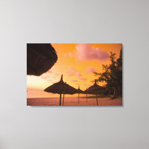 Palapa style beach huts at sunrise, Belle Mare 2 Canvas Print