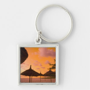 Palapa style beach huts at sunrise, Belle Mare 2 Key Ring