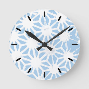 Pale blue geometric pattern round clock